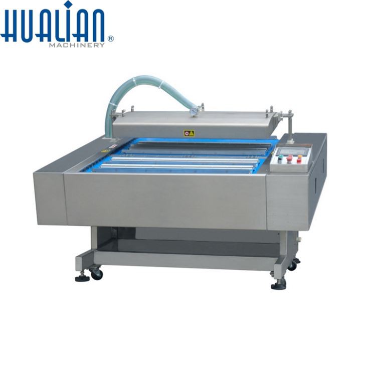 automatic-continuous-vacuum-packaging-machine29224425580-1.jpg Máquina automática de envasado al vacío continuo